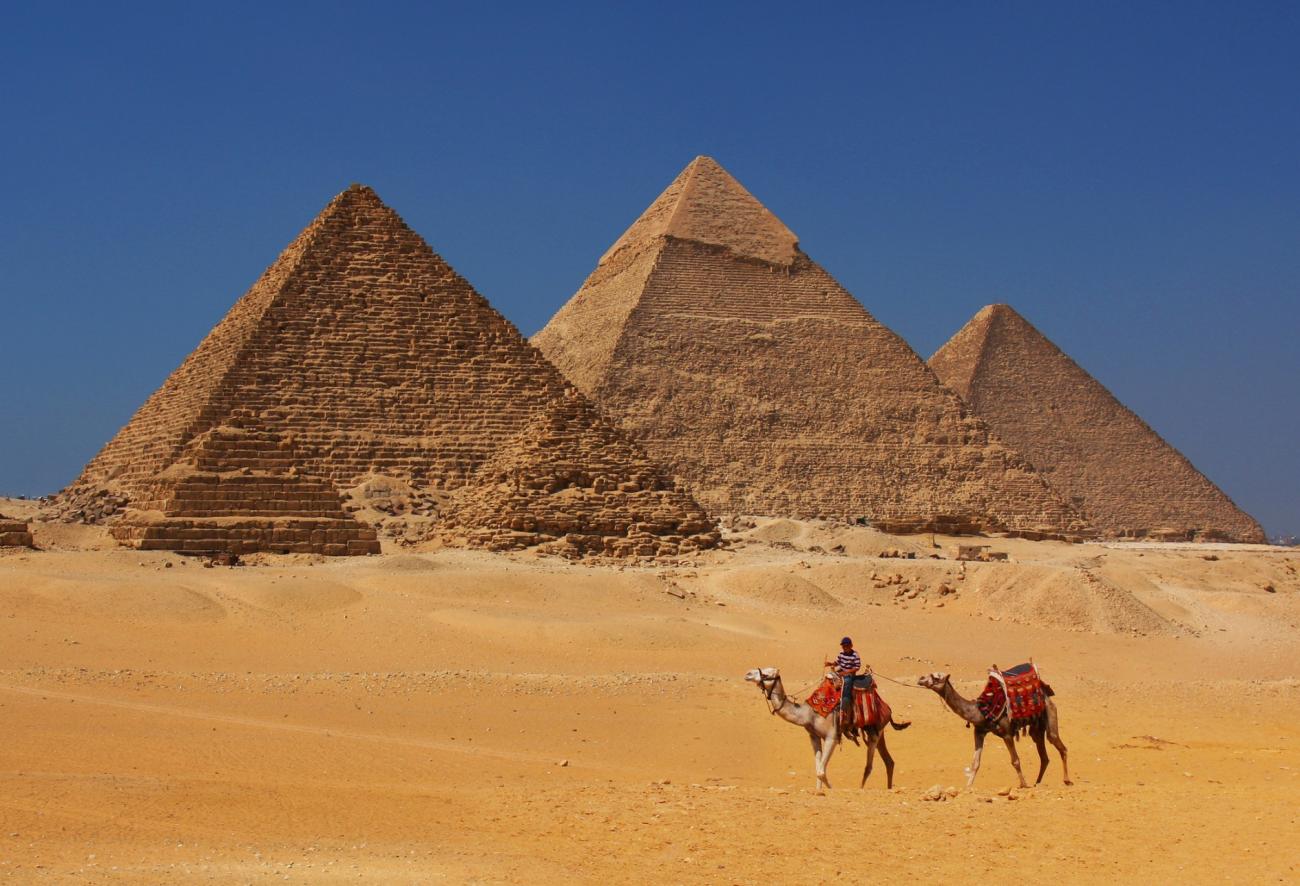 A must places to visit is Cairo and the Giza Pyramids by camel back